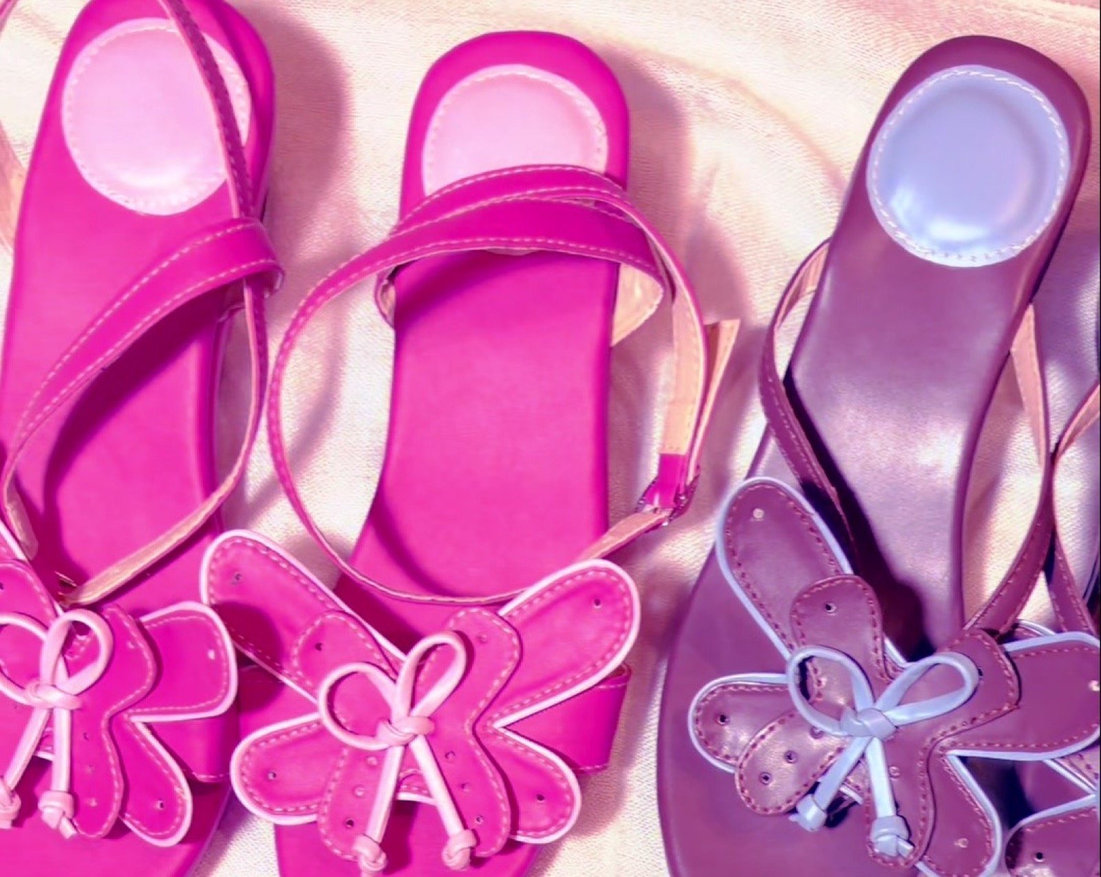 Butterfly bow sandals in hot pink and plum